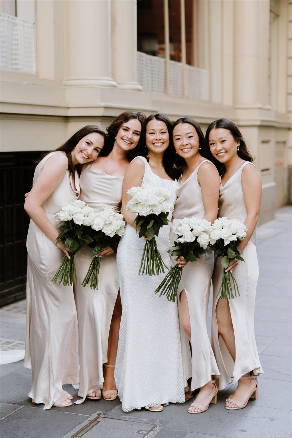 Bridesmaids holding bouquets en masse Melbourne wedding Studio Green Melbourne