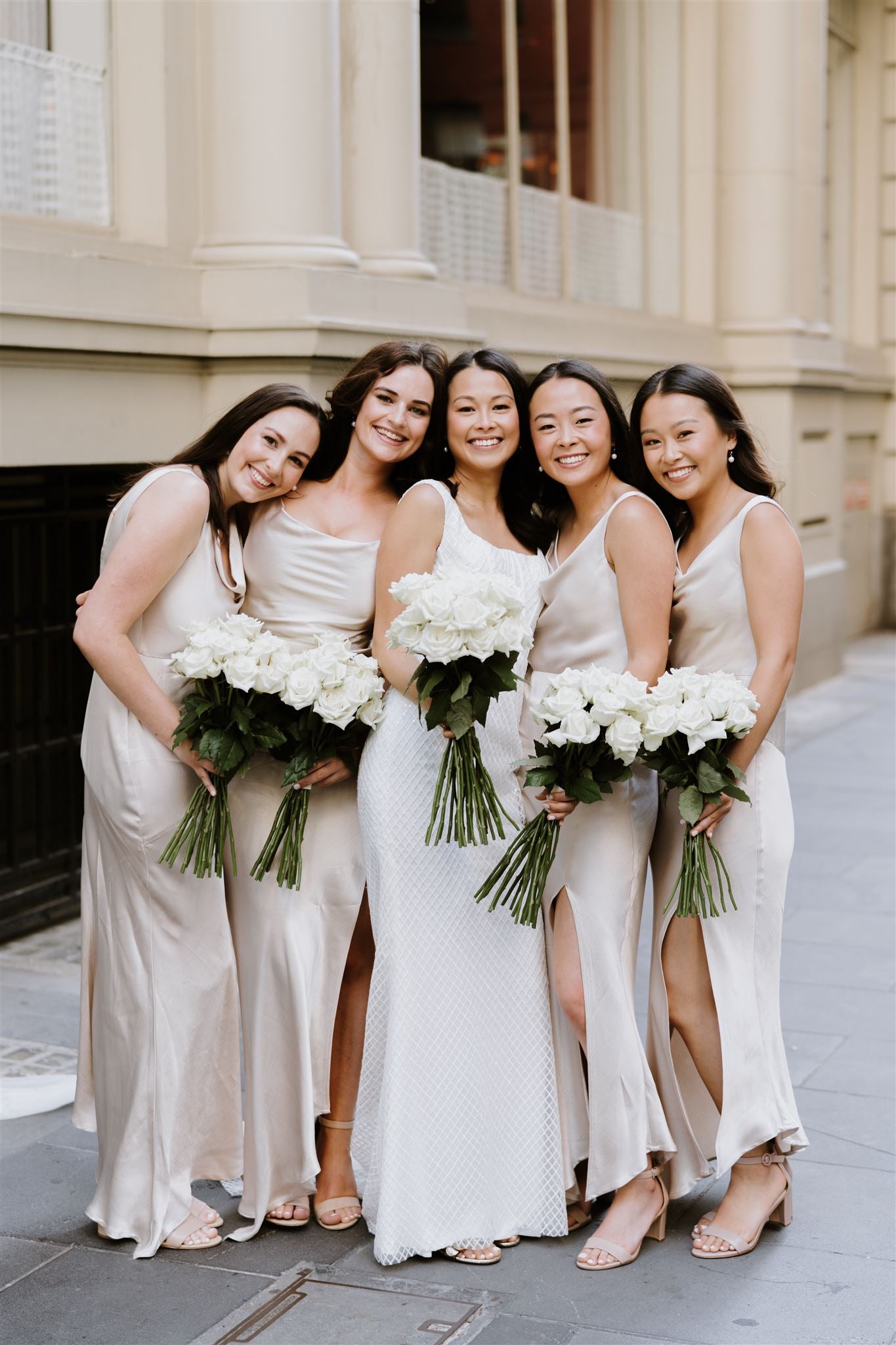 Bridesmaids holding bouquets en masse Melbourne wedding Studio Green Melbourne